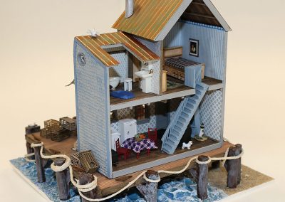 Jeannie Napolitano built this miniature, “Sea Shanty” at a scale of 1/4”:1’.