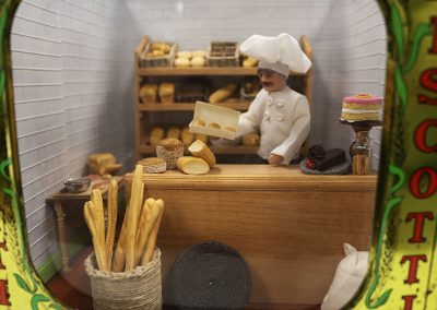 Julia Tollafield built her 1/12 scale “Italian Bakery” inside a vintage biscotti tin.