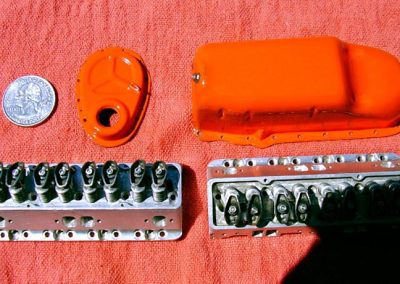 The stamped steel front cover and oil pan are included here.