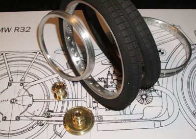 Scale BMW tires sit atop Pere's plans.