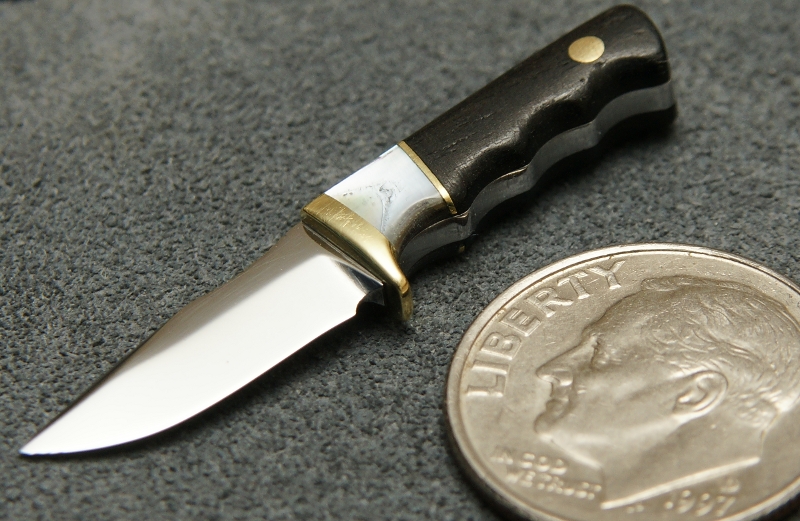 Miniature Fixed Blade Knife Brian's miniature fixed blade knife is hardly bigger than a dime.