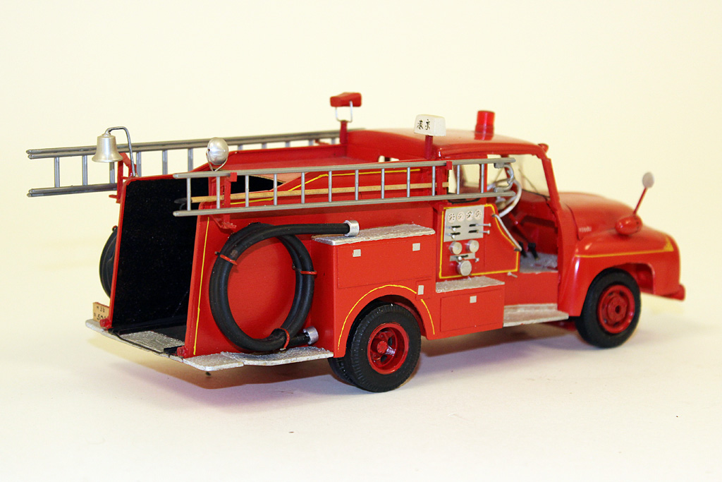 A 1/32 scale Isuzu-Morita hose cart truck.