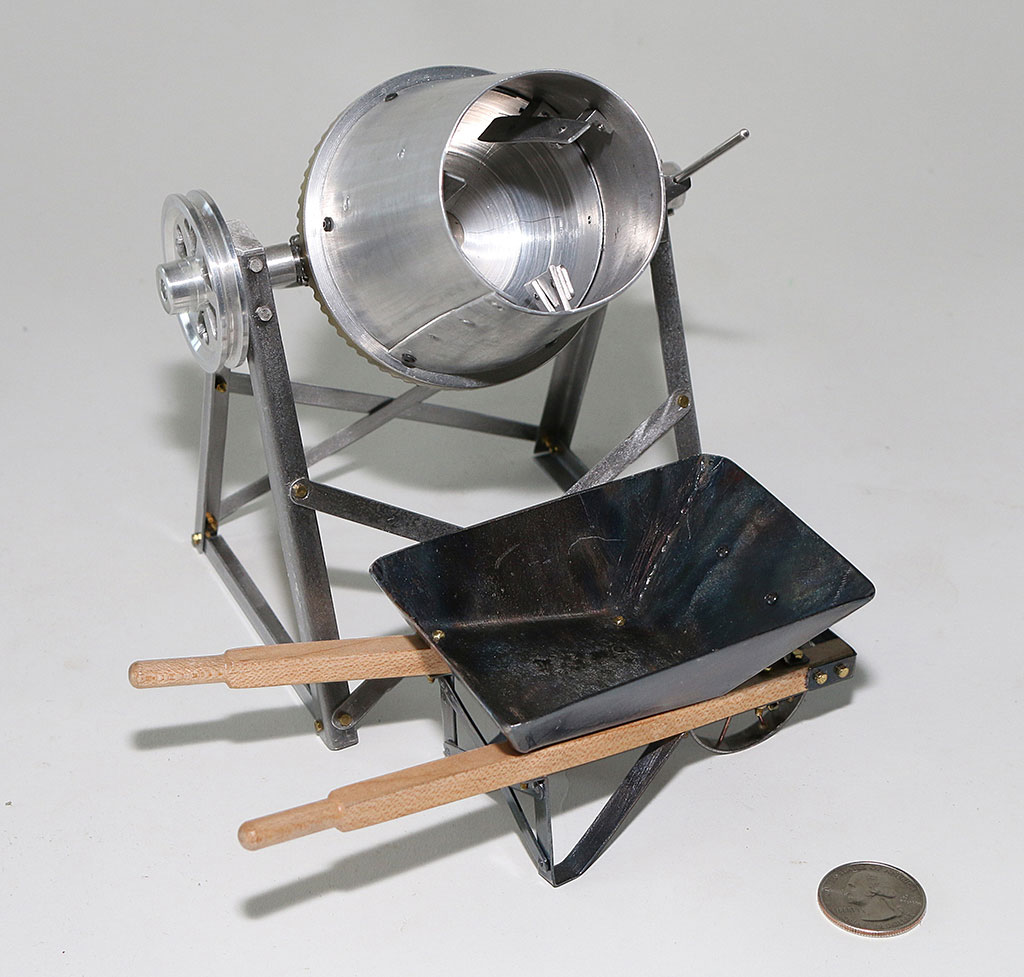 Cement Mixer Birk's miniature cement mixer with a scale wheelbarrow.