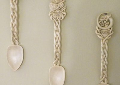 These carved wooden spoons feature a Norse theme, and the names of Clayton's family.