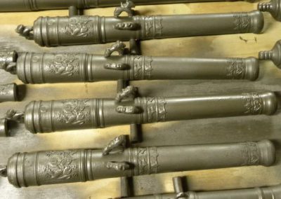 Clayton then took molds and reproduced the barrels in resin.