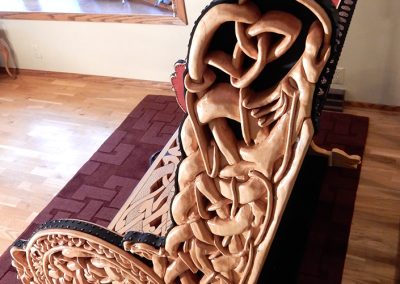 Clayton's custom built carved wooden bench.