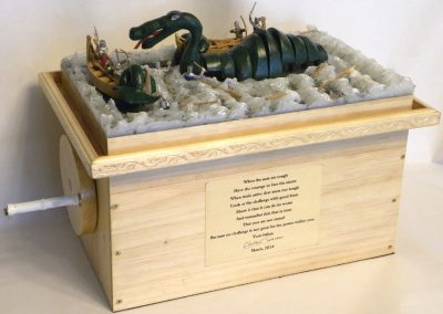 This hand cranked sea monster toy is action packed.