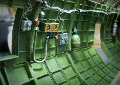 More waist gun equipment inside the fuselage.