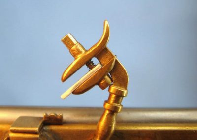A close-up of the scale wheel lock pistol.