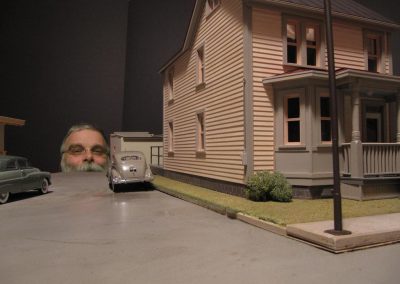 Michael and his finished model home.