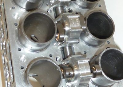 A close-up of the gear driven sleeve valve actuating mechanism.