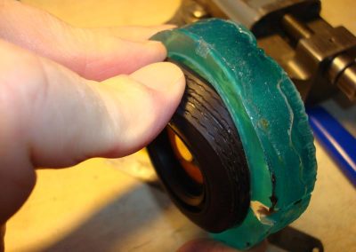 A tire is removed from the polyester mold.