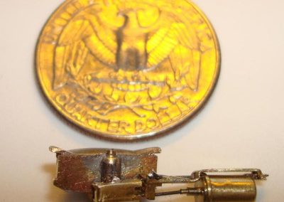 The brass windshield wiper motor was starting to take shape.