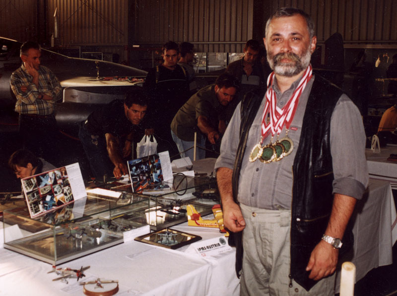Andrzej Ziober Andrzej wears the four gold medals he was awarded for his Junkers G-23 and Liberator models.