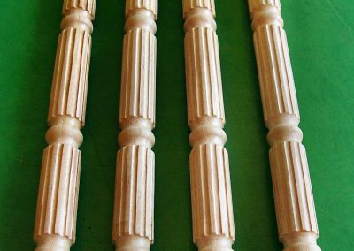 Four fluted support columns.