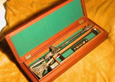 A miniature wheel lock pistol combined with a medieval mace.