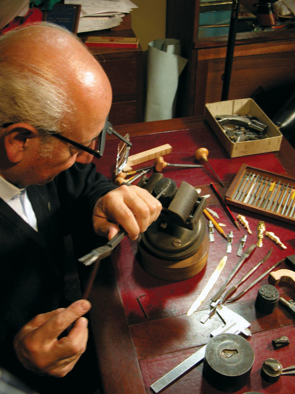 of Antonio Rincón at Work Master miniature gunsmith Antonio Rincón at work on a project.