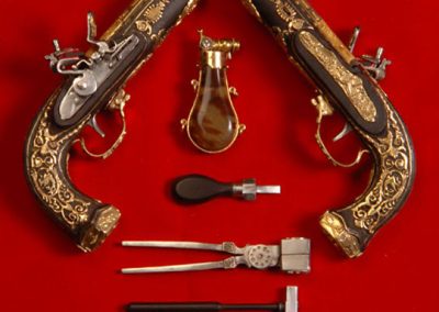An ornate set of 1/3 scale Boutet dueling pistols.