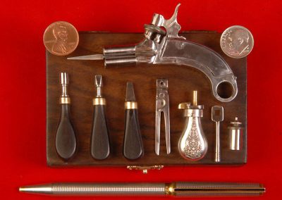 The four-barreled Rigby pistol.