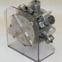 A rear view of the Mike GR6-120 6-cylinder 2-cycle radial model airplane engine.