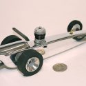 A hybrid dragster tether car.