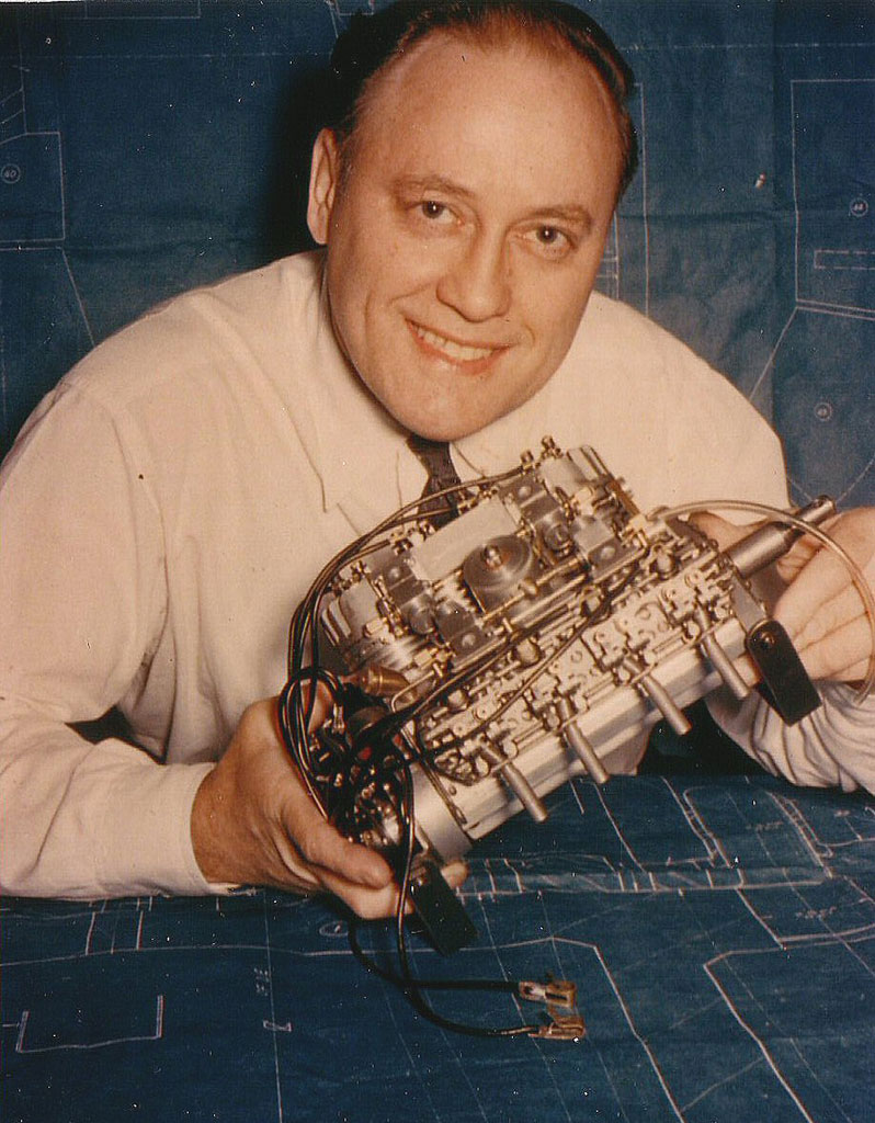 John Storoz poses with an engine.