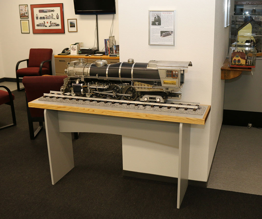 The 3/4"-scale live steam 4-6-4 locomotive on display.