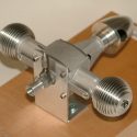 A Cooney Bourke .09 cubic inch 2-cycle model airplane engine.