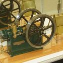 A Fairbanks Morse hit n' miss engine with cover.