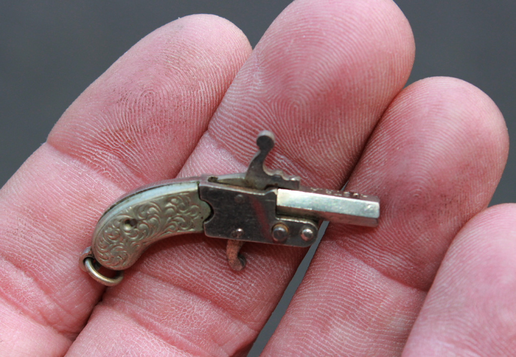 A miniature 2mm Pinfire Berloque pistol.