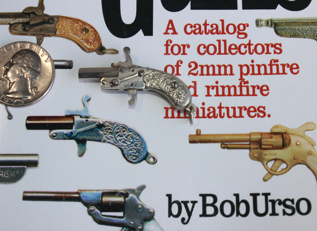 Franz Pfanni's Pinfire pistol sitting on the cover of a book which featured a similar pistol.