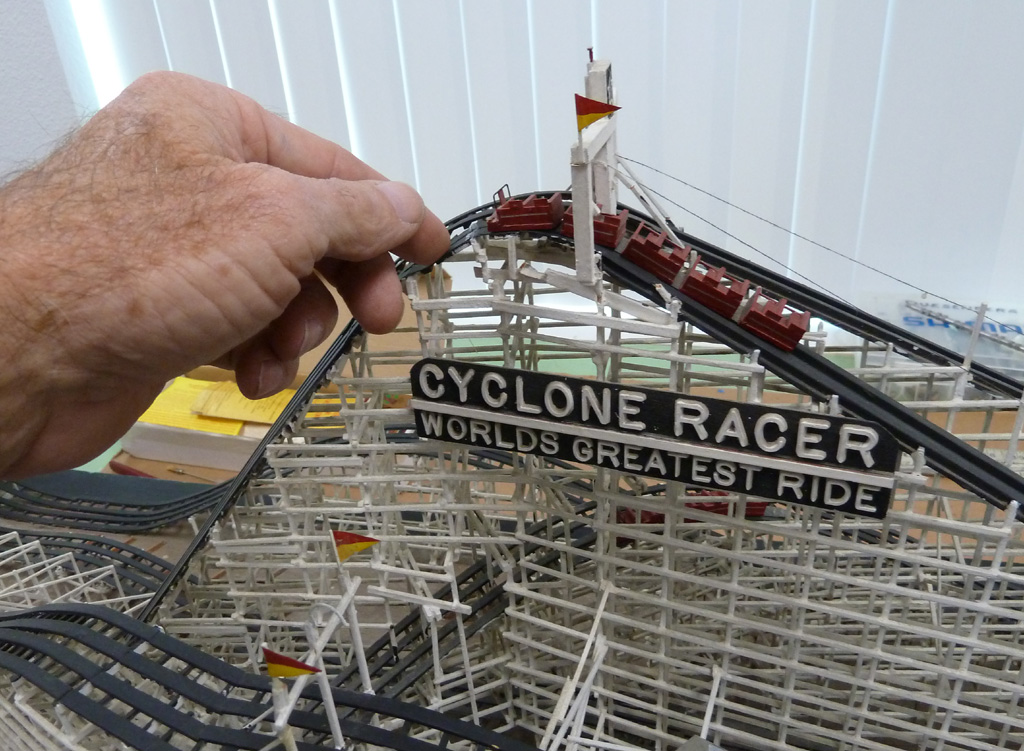This wooden model of the roller coaster, "Cyclone Racer" was built in HO scale.