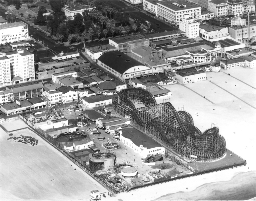 A black and white photo of the original Cyclone Racer roller coaster in Long Beach, CA.