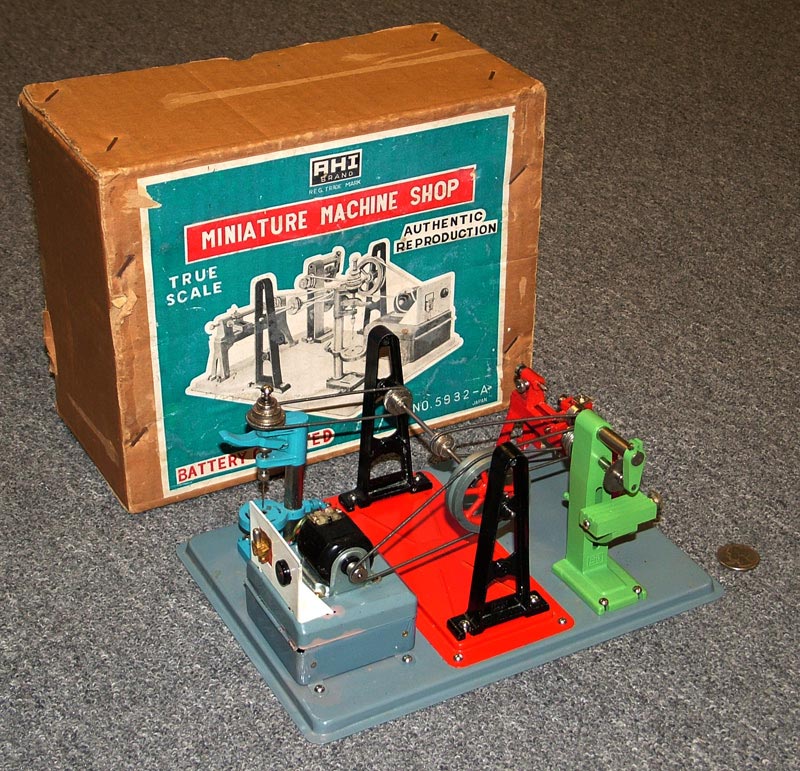 A miniature electric diecast toy machine shop made by AHI.