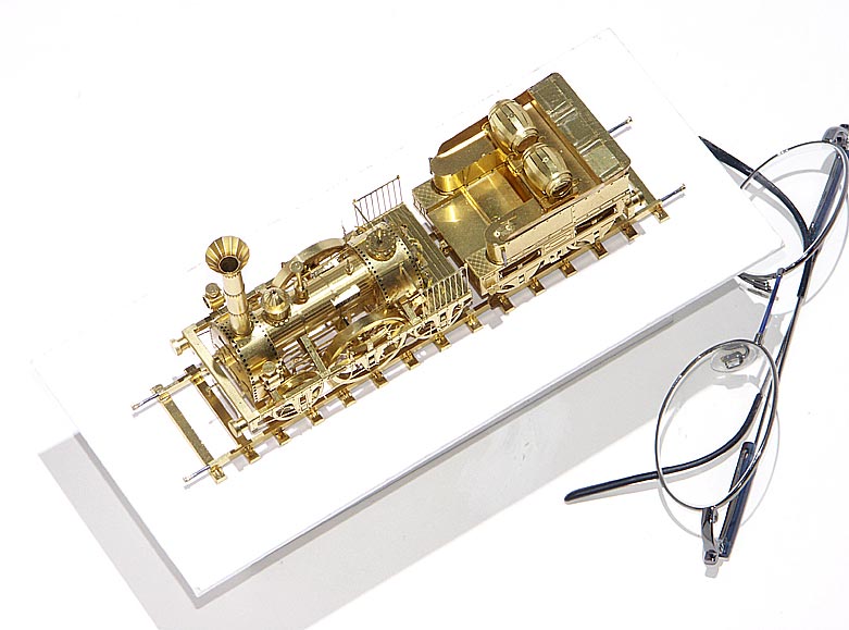 A very delicate brass sculpture of the 1835 Adler steam locomotive and tender.