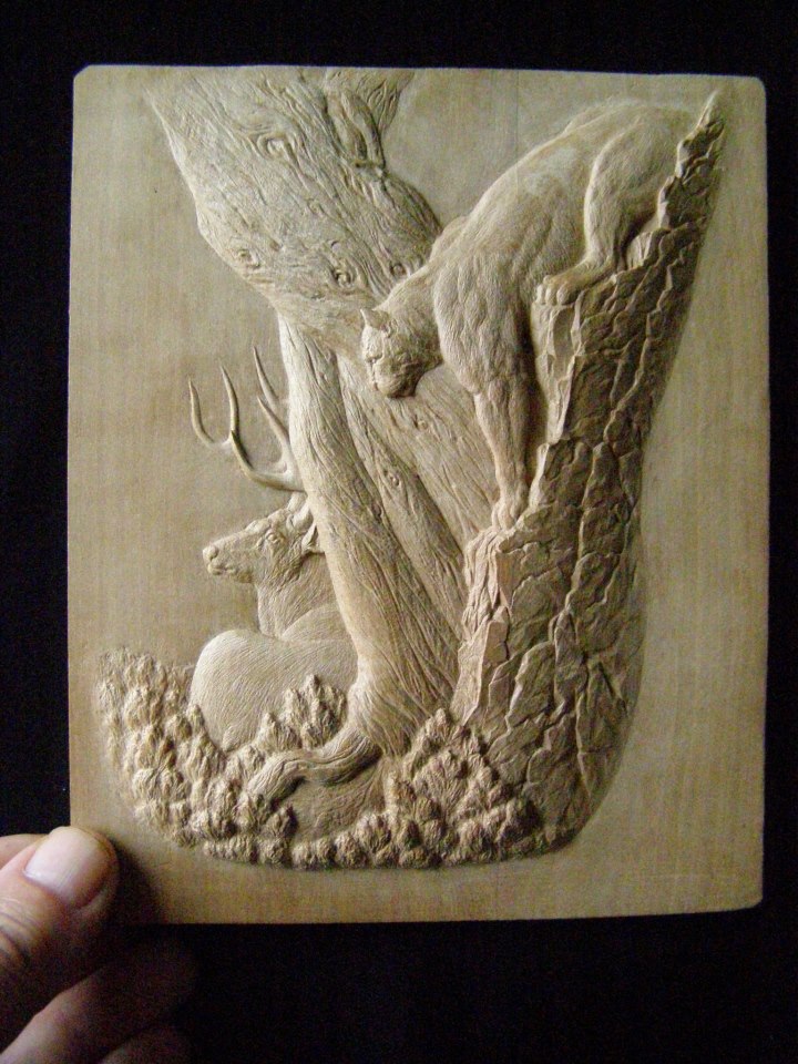 Carved Wooden Relief Wildlife and other natural themes are common in Mr. Rusinov's small wood carvings.