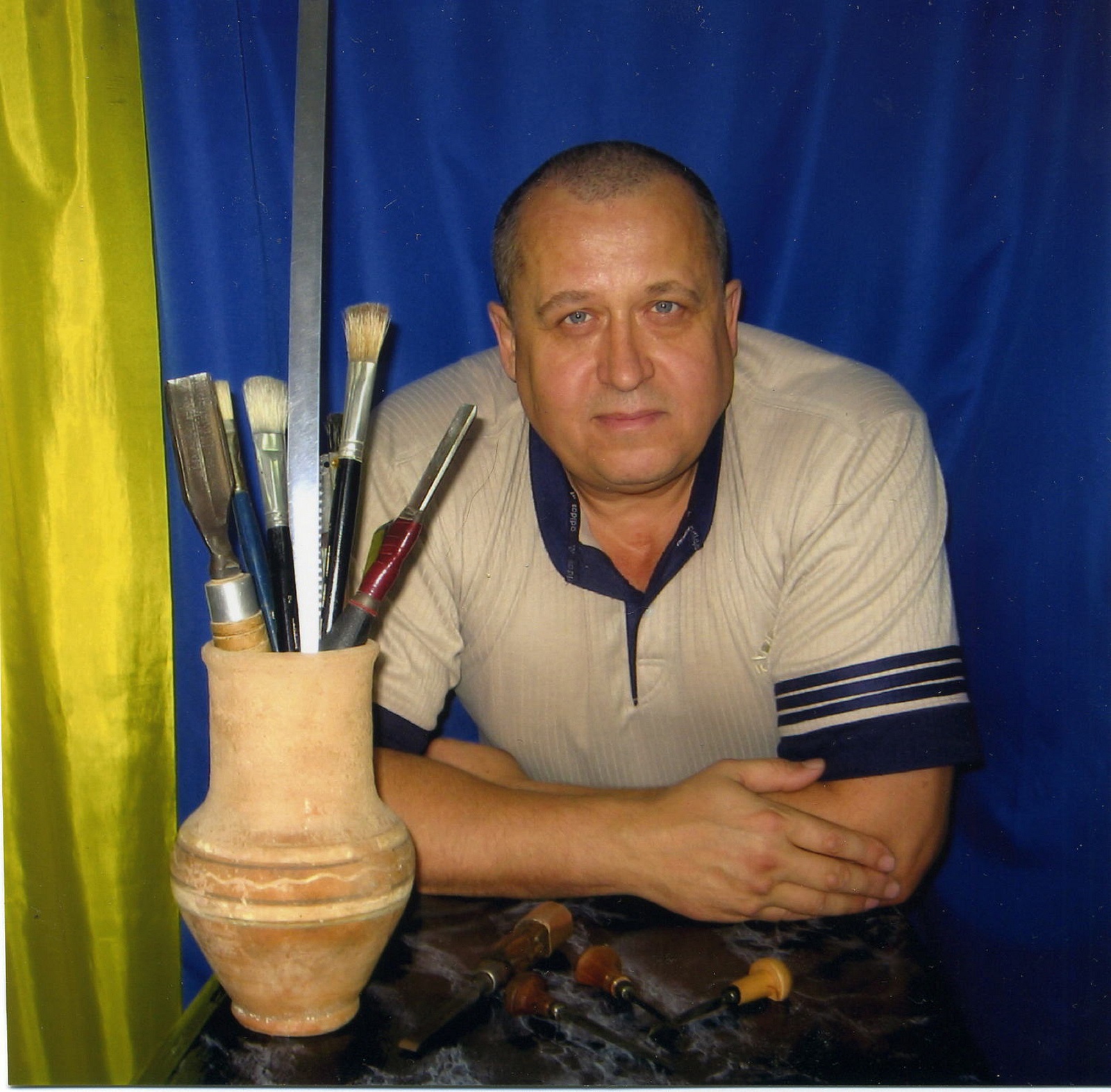 Vladimir Rusinov Vladimir Rusinov stands with some of his woodworking tools.