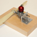 A McCoy Duro Glo .049 Diesel model airplane engine with a 7” plastic prop.