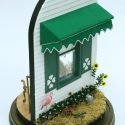 This 1/12 scale dollhouse scene depicts a child’s bedroom.