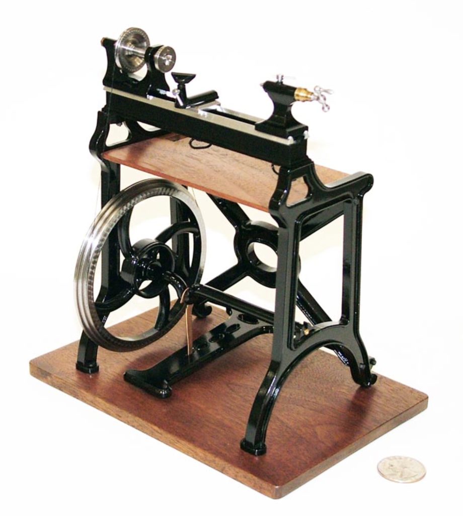 This miniature James Stewart treadle lathe was built at 1/8 scale.