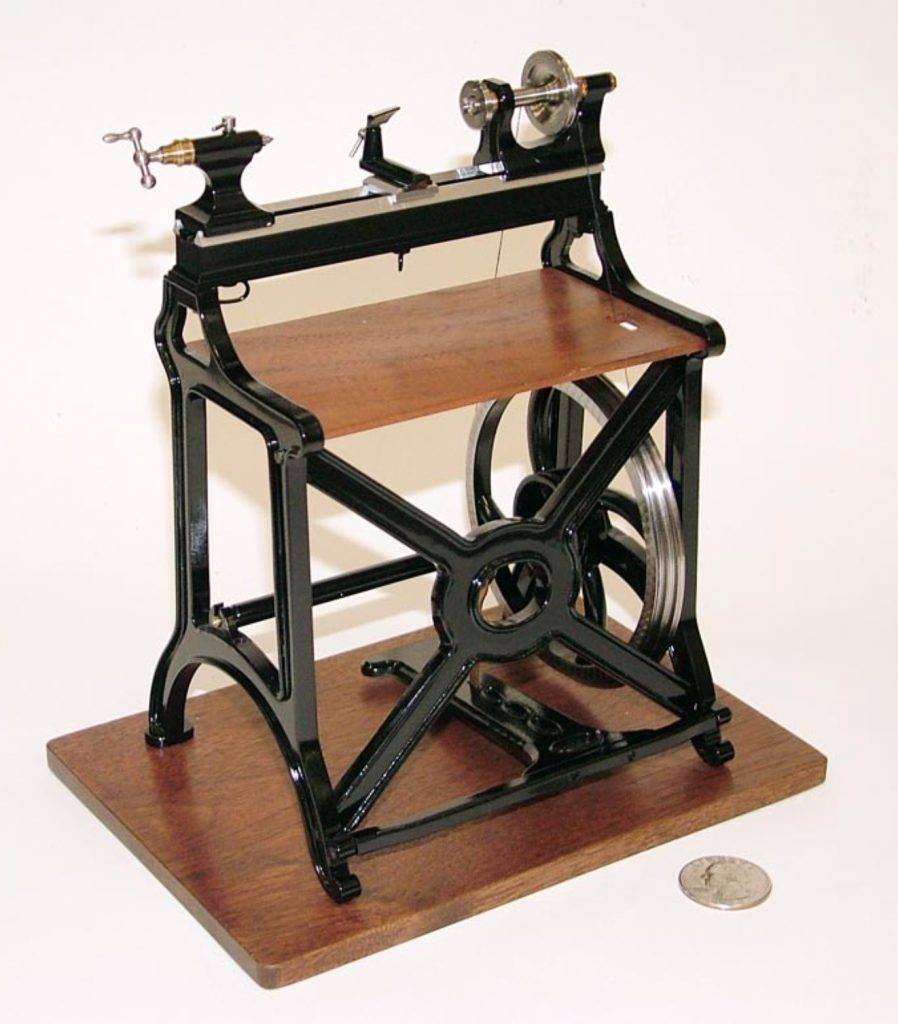 This miniature James Stewart treadle lathe was built at 1/8 scale.