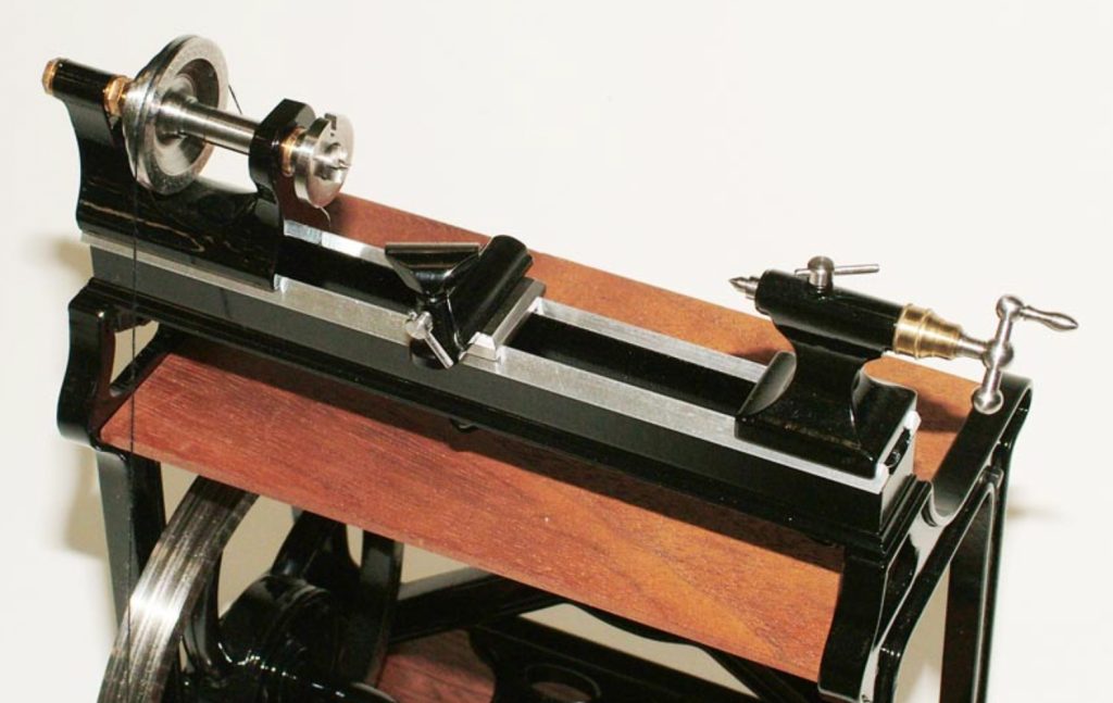 This miniature James Stewart treadle lathe was built at 1/8 scale.