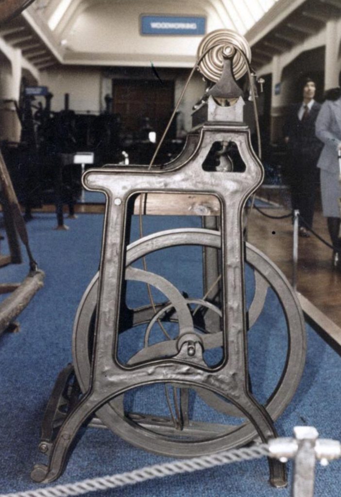 An original full-size James Stewart treadle lathe in the Henry Ford Museum.