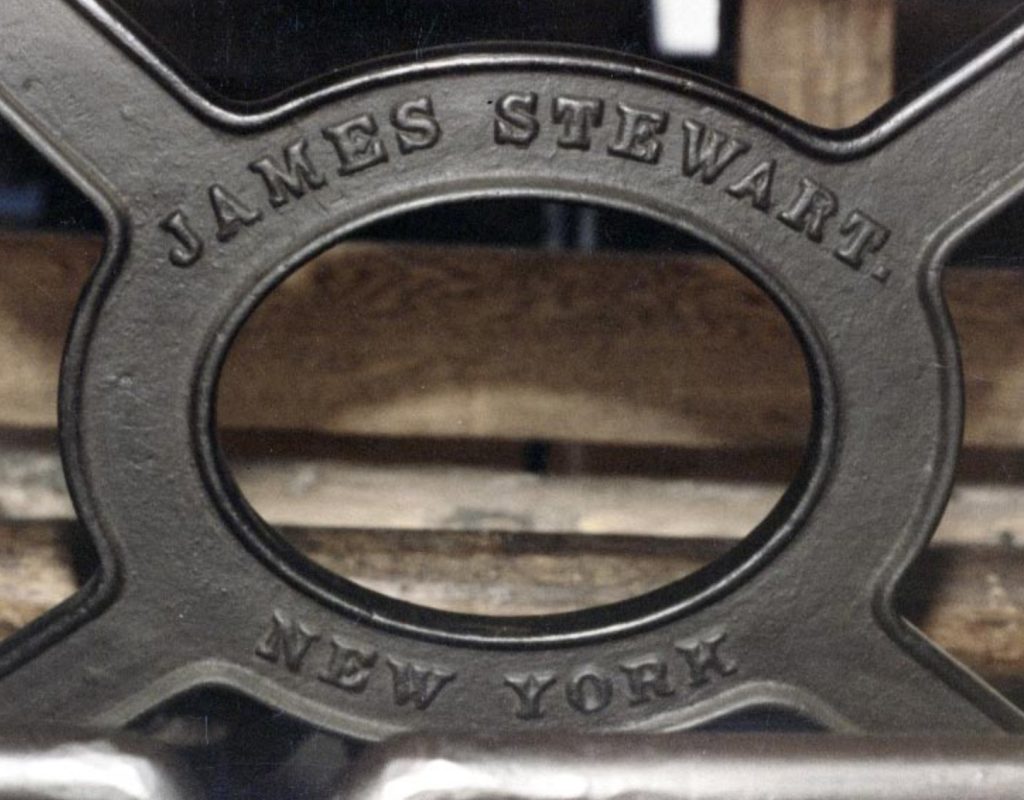 An original full-size James Stewart treadle lathe in the Henry Ford Museum.