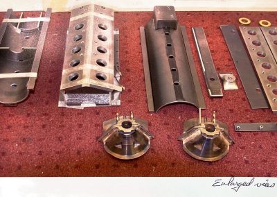 Various parts for the 1/6 scale Liberty V-12 engine.