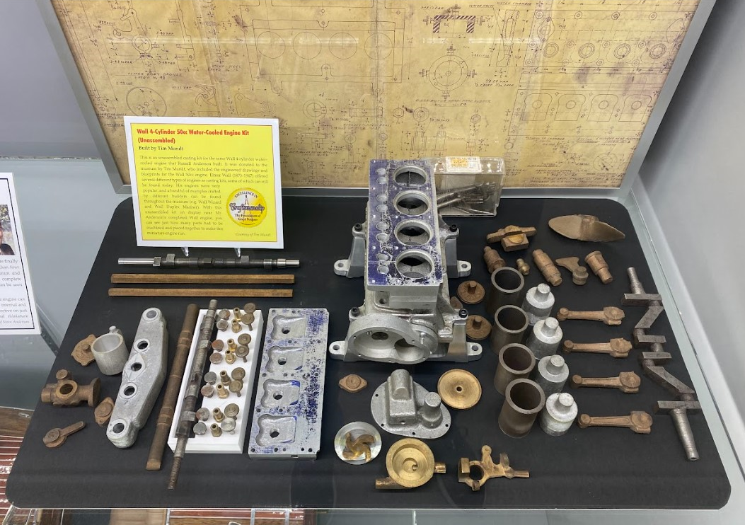 An unassembled casting kit for an Elmer Wall 4-cylinder water-cooled gas engine kit.