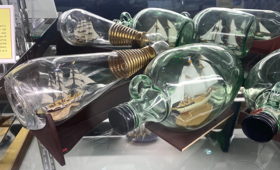 Robert “Bob” Johnson (1931–2011) handmade these four ships in bottles, which were built between 1955-2002.